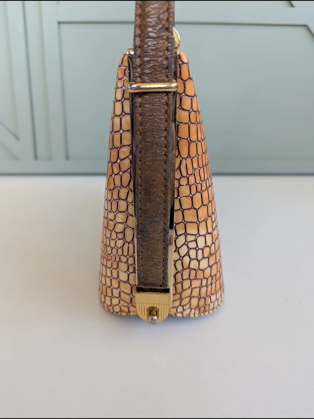 vintage 1950s-1960s frame handbag, featuring an embossed crocodile pattern